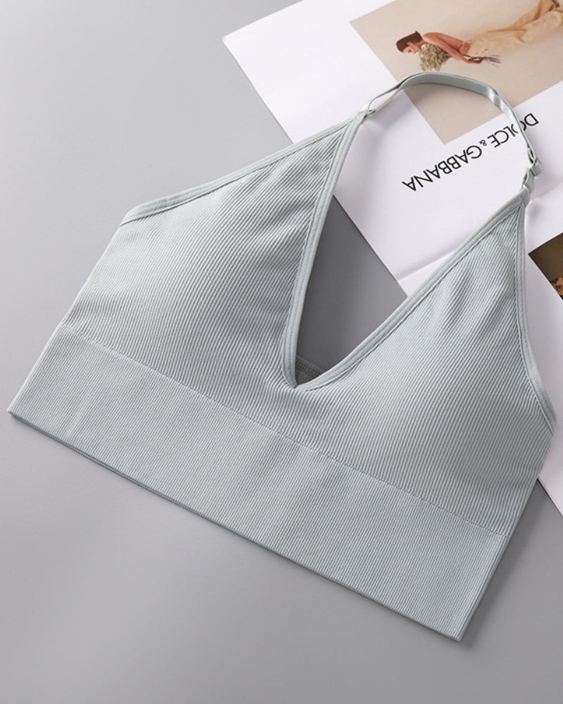 Soutien inalámbrico triangular con escote profundo en V, cuello halter y espalda descubierta