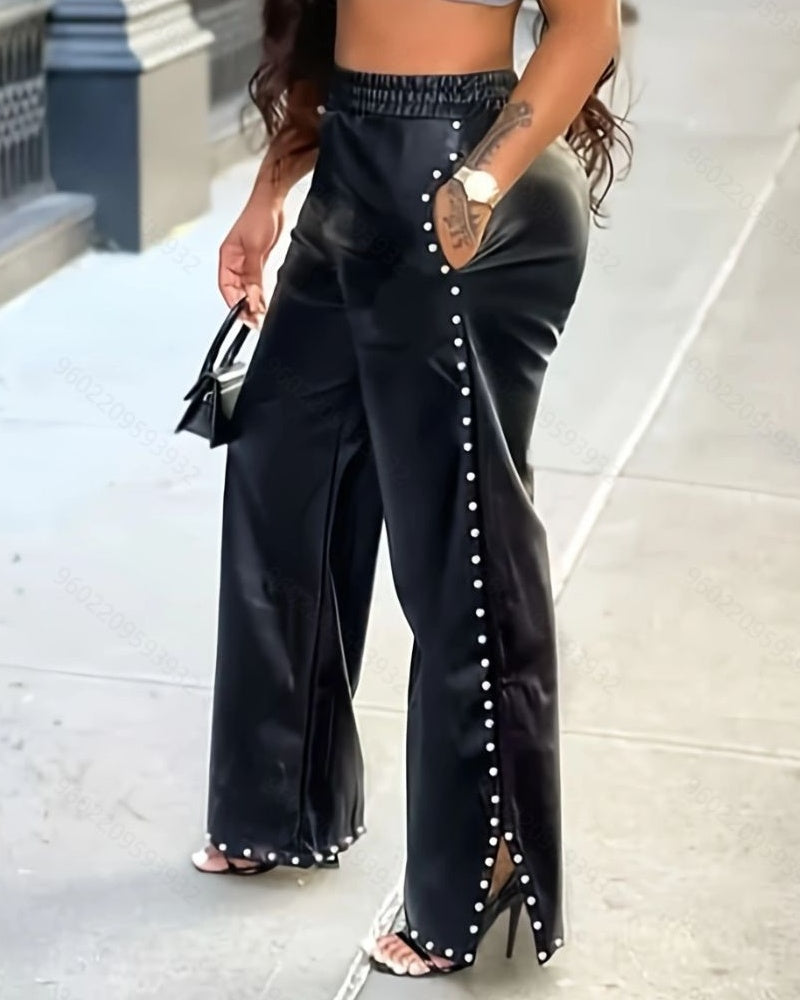Pantalones de cuero sueltos y anchos con cuentas