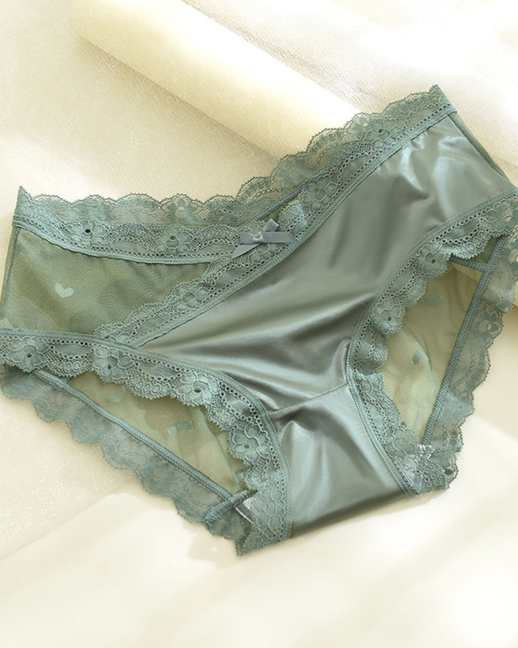 Panties de cintura media-alta para mujer con patrón de corazón, encaje en el borde y combinación de malla