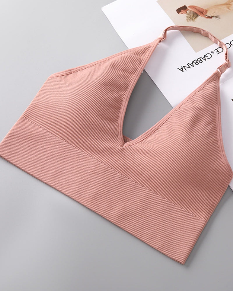 Soutien inalámbrico triangular con escote profundo en V, cuello halter y espalda descubierta