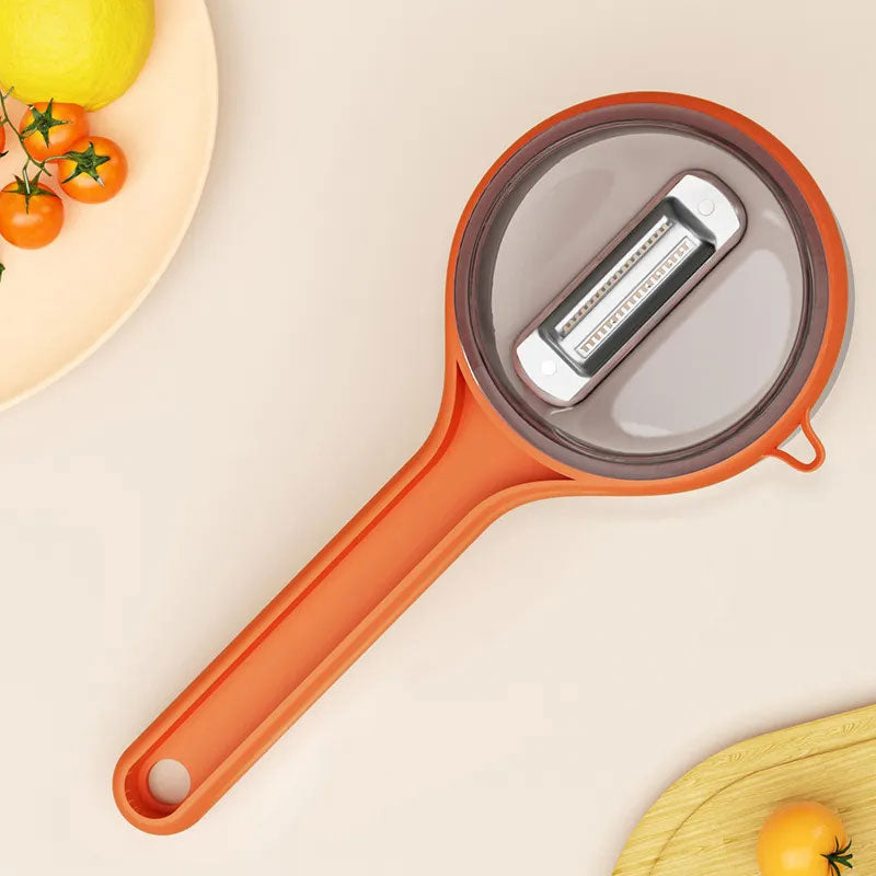 🔪✨ Pelador Multifuncional con Cubo de Almacenamiento de Residuos – Cocina Más Rápida, Limpieza Fácil y Orden en tu Espacio 🍅🥕🧹