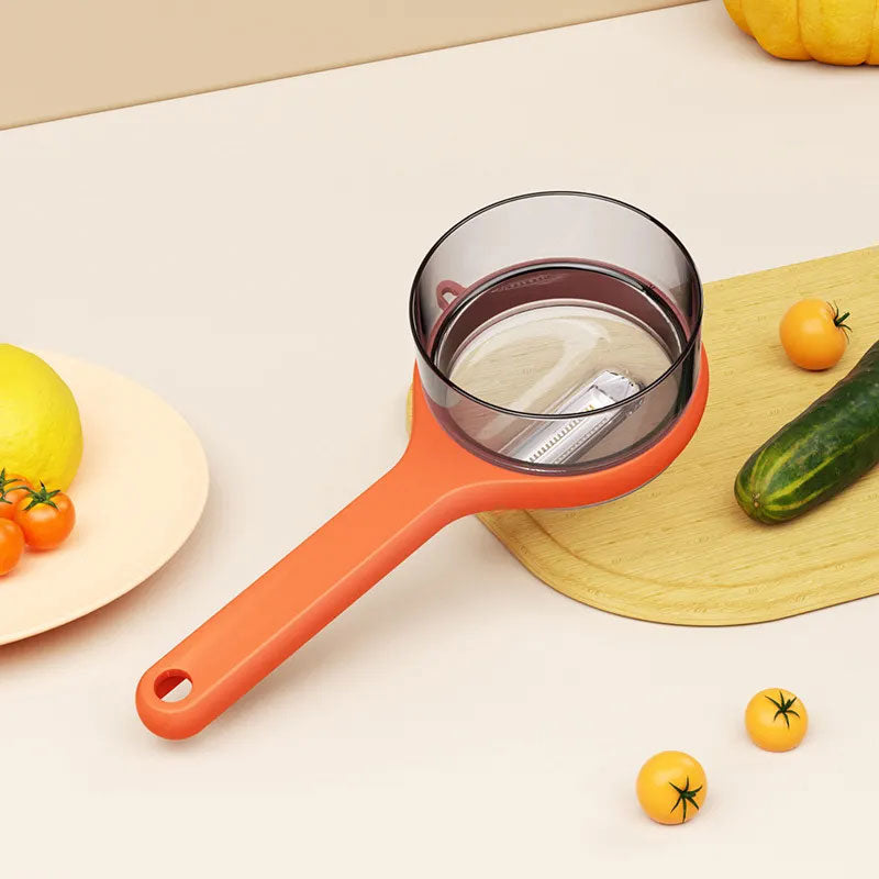🔪✨ Pelador Multifuncional con Cubo de Almacenamiento de Residuos – Cocina Más Rápida, Limpieza Fácil y Orden en tu Espacio 🍅🥕🧹
