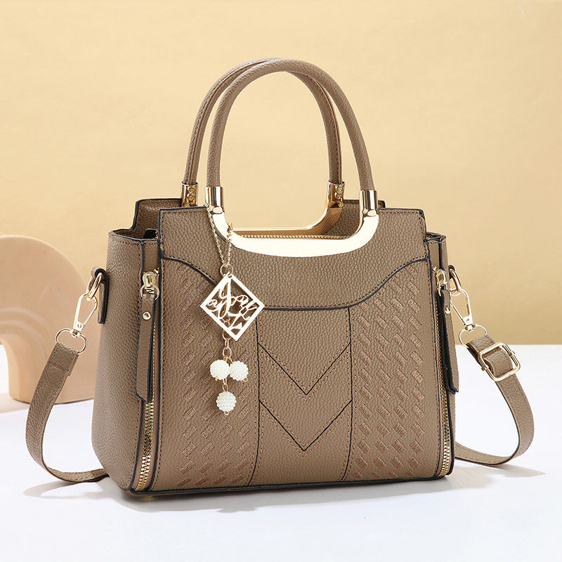 👜💥 ¡OFERTA RELÁMPAGO 50% OFF! Bolso de Mano Premium con Costuras en V – Elegancia y Organización Diaria